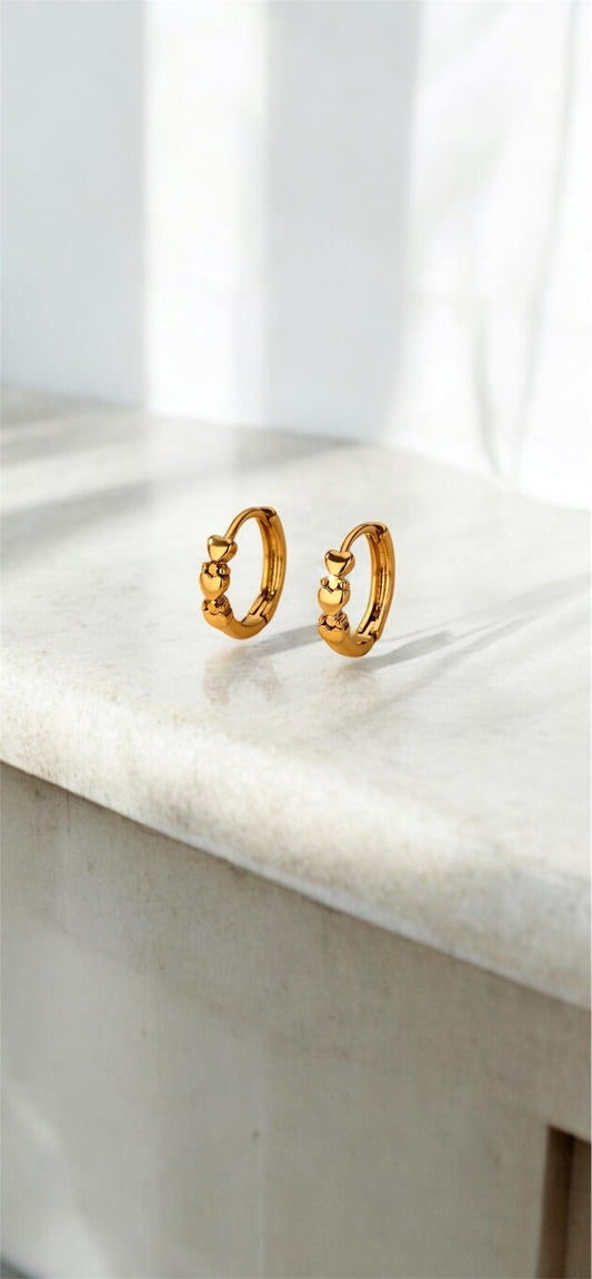 Zurich Row Of Hearts Gold Huggie Hoop Earrings